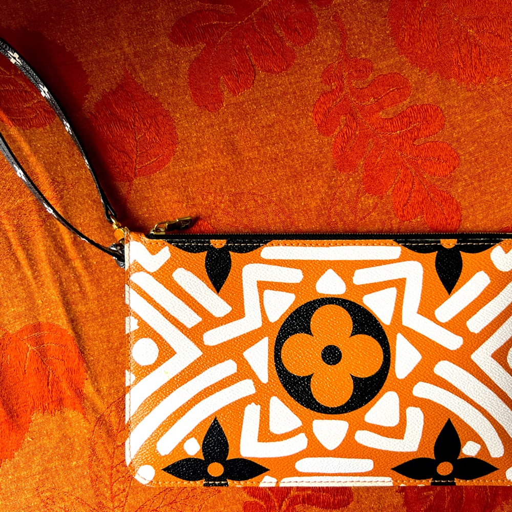 LV clutch bought new in store used a handful of times.
